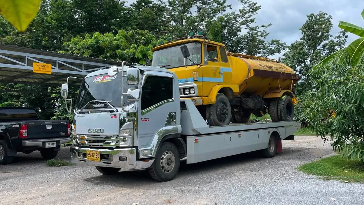 Slide truck carrying a small water tanker